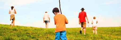 family out for a walk in the countryside