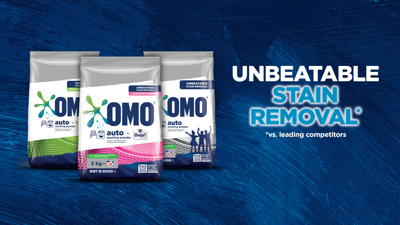 OMO auto powder range lined up on a blue background