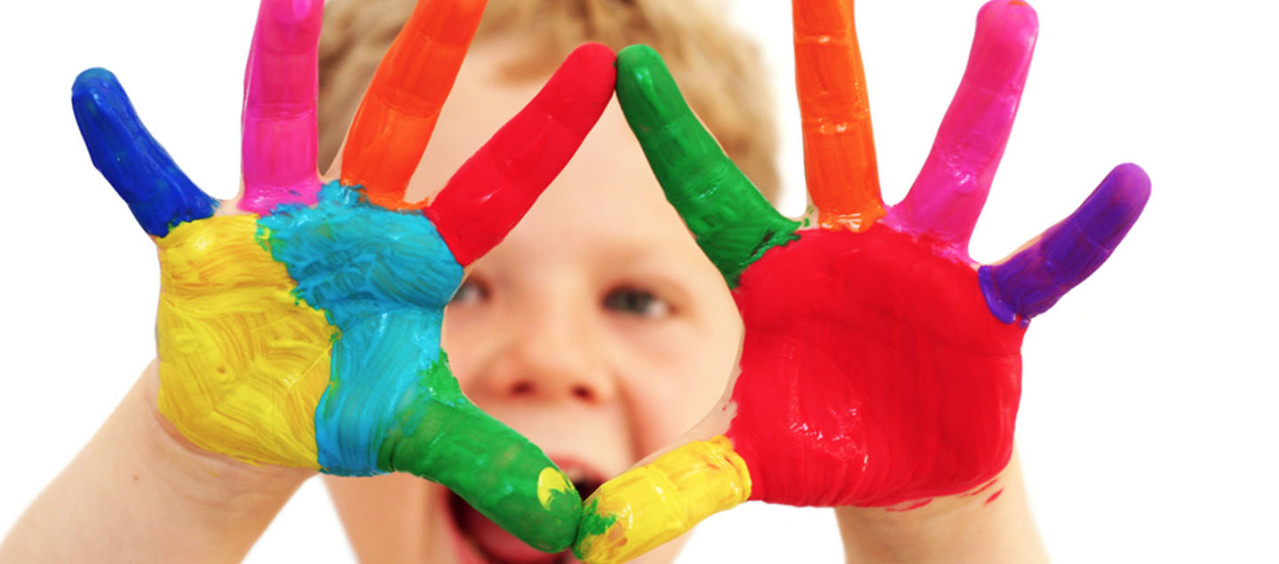 Child with paint on it's hands