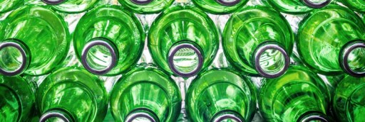 Stacks of green glass bottles