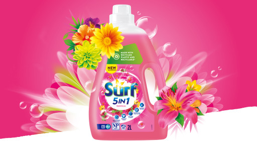 Surf 5in1 bottle surrounded by flowers